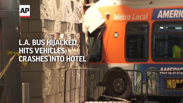 Bus hijacked in Los Angeles crashes into hotel (Courtesy: KTLA via AP ...