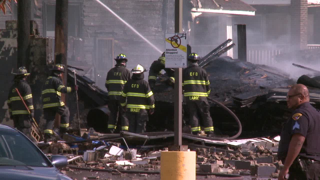 Fire fighters dig through debris after building explosion in Cleveland ...